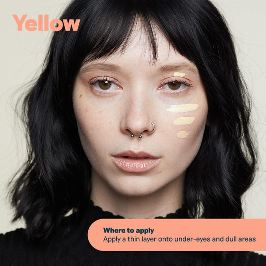 Exa Beauty yellow color corrector application swirl for seamless blending.
