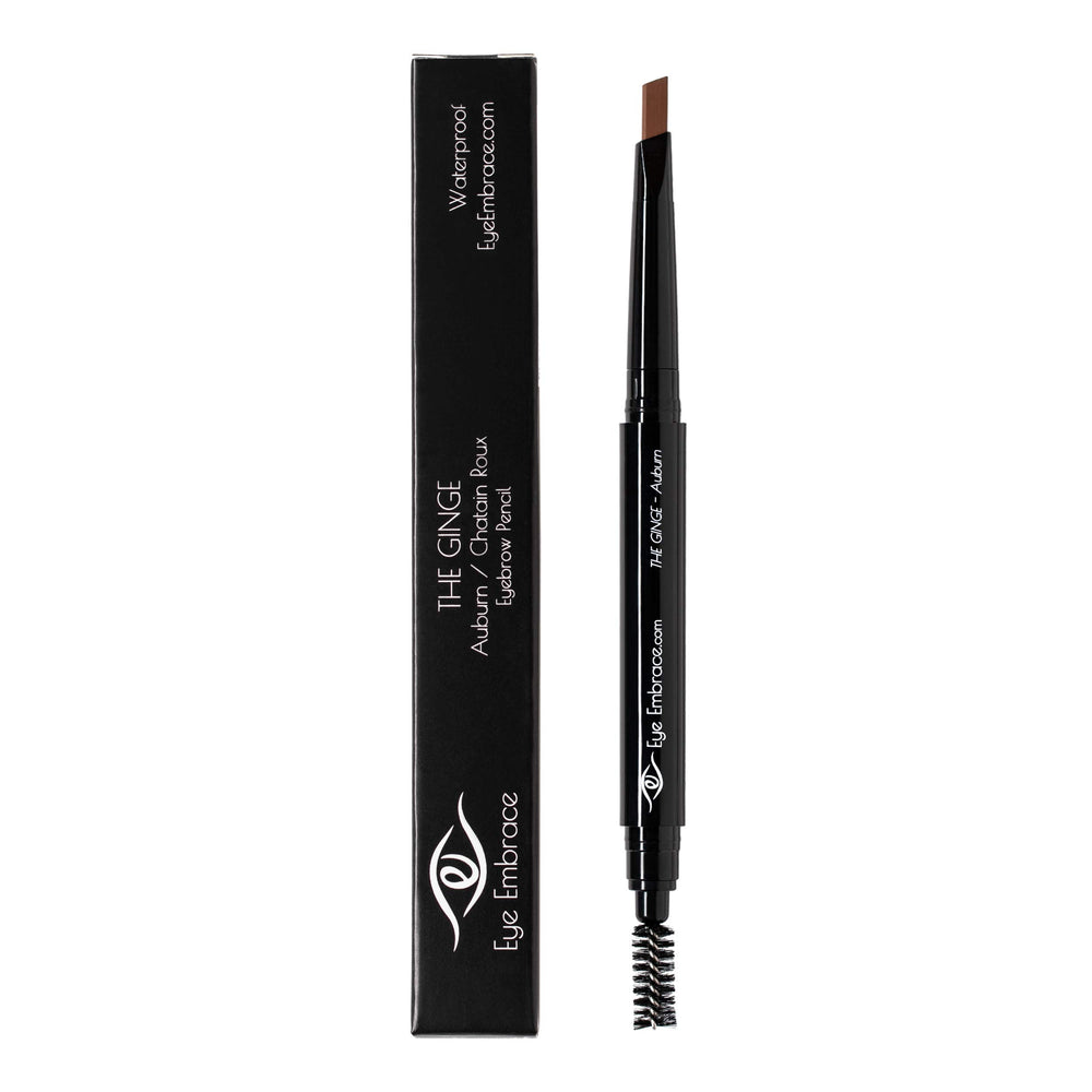 Spoolie brush blending brows for a natural finish