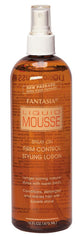 Fantasia Liquid Mousse Spray bottle detangles and adds shine.
