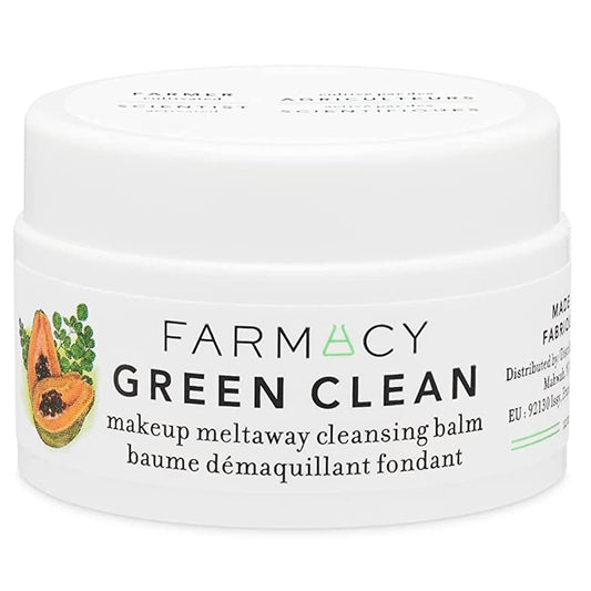 Farmacy Green Clean remover balm applied to dry skin for gentle cleansing.