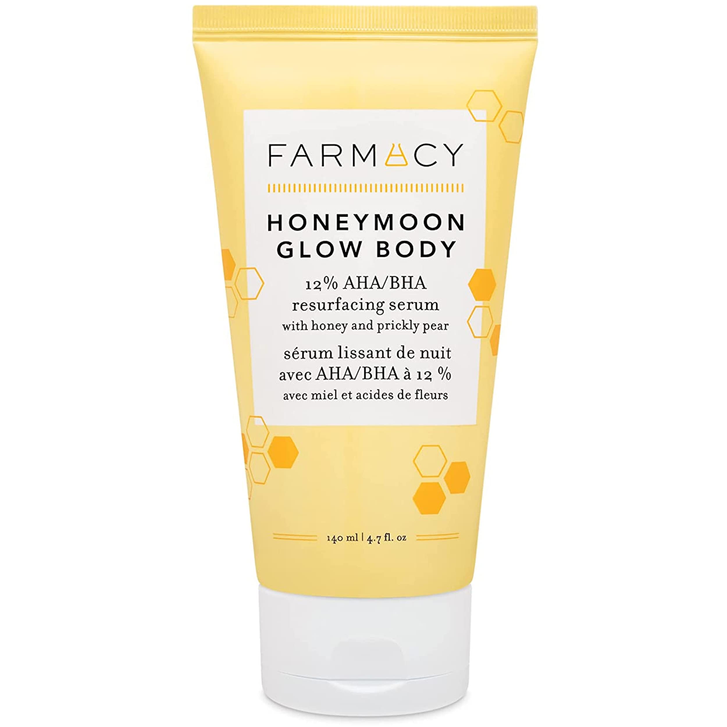 Farmacy Honeymoon Glow Body bottle close-up showing a hydrating exfoliant for dry skin