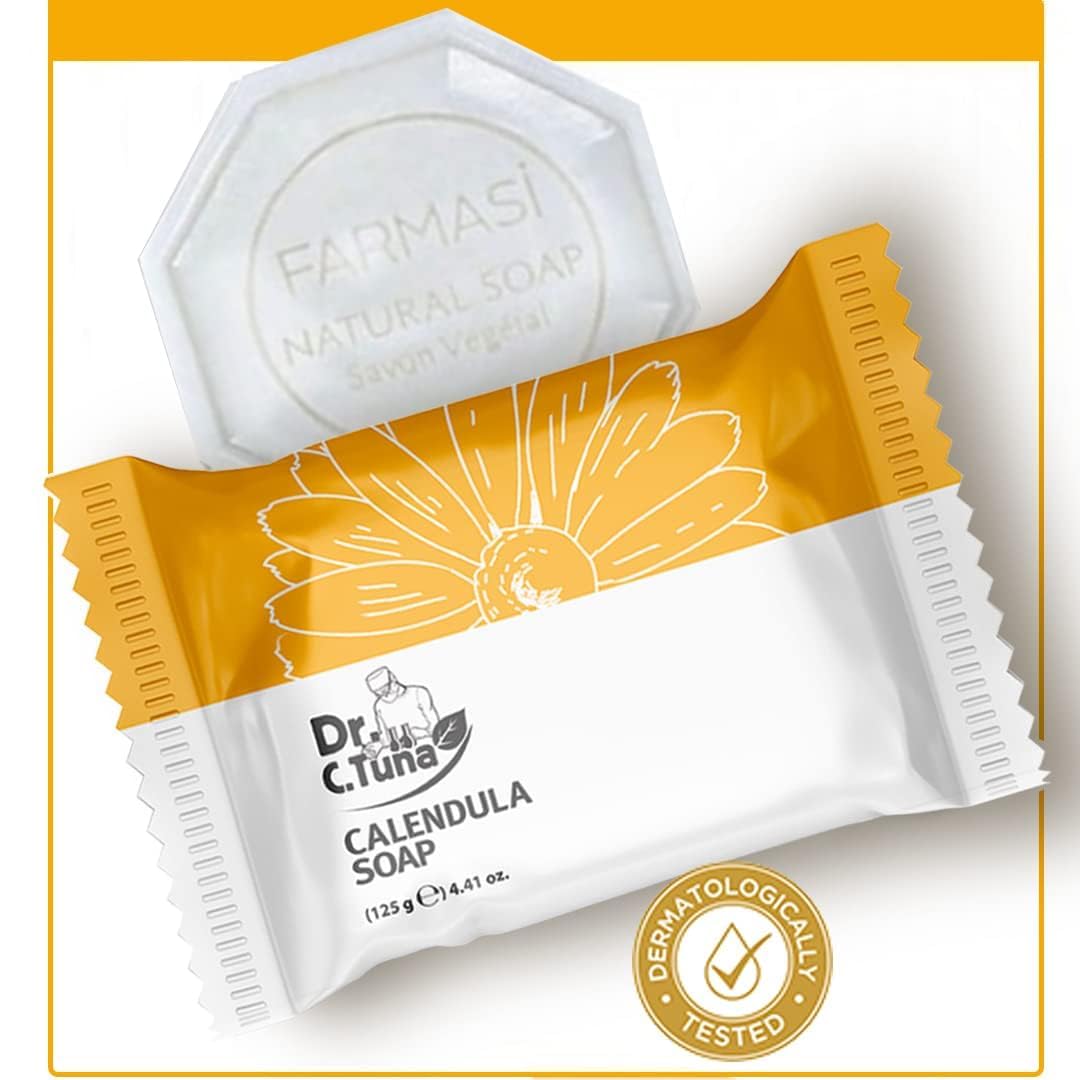 FARMASi calendula soap bar resting on a soap dish highlights natural ingredients.