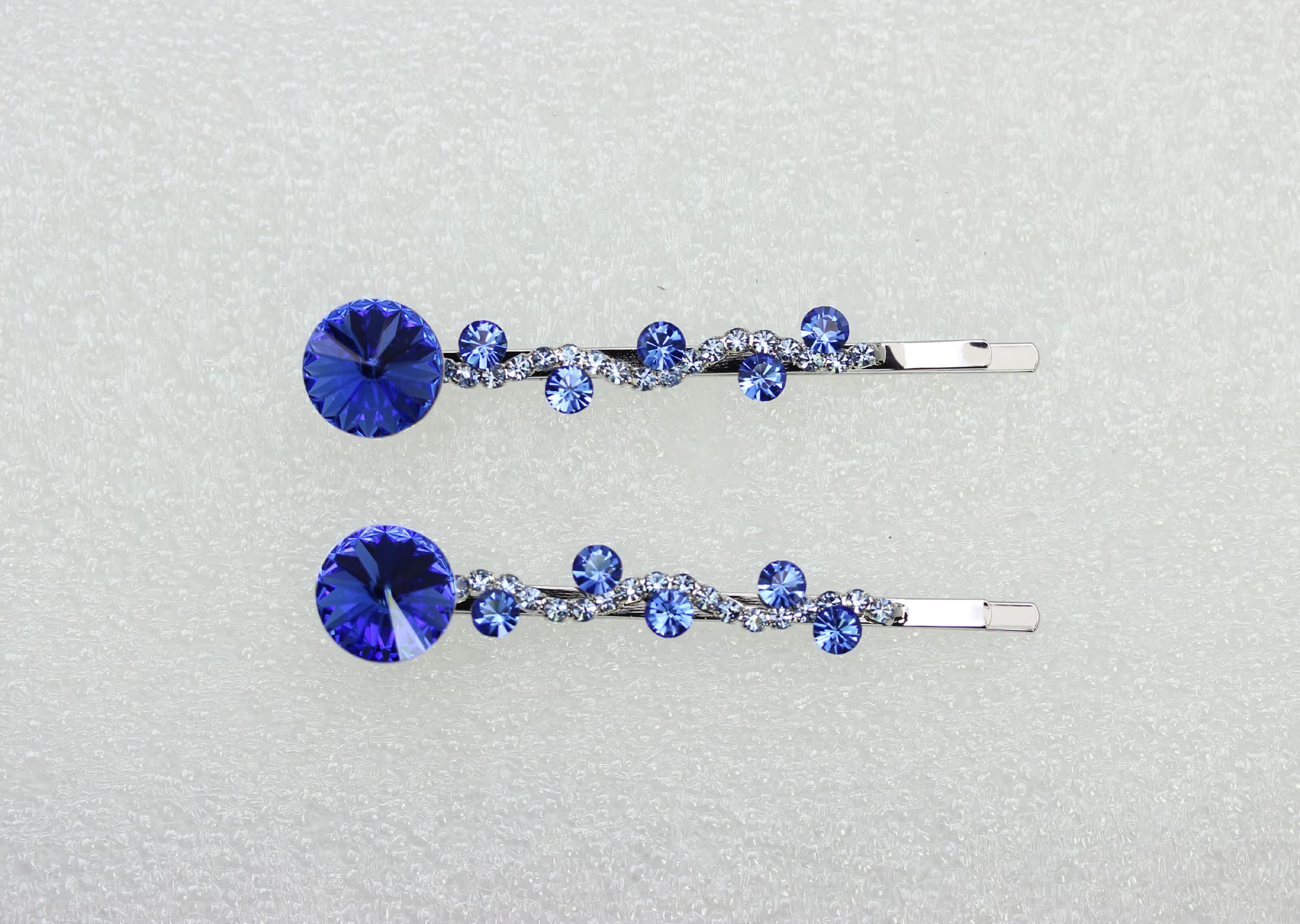 Faship blue sapphire crystal hair clip close-up showing shimmering detail