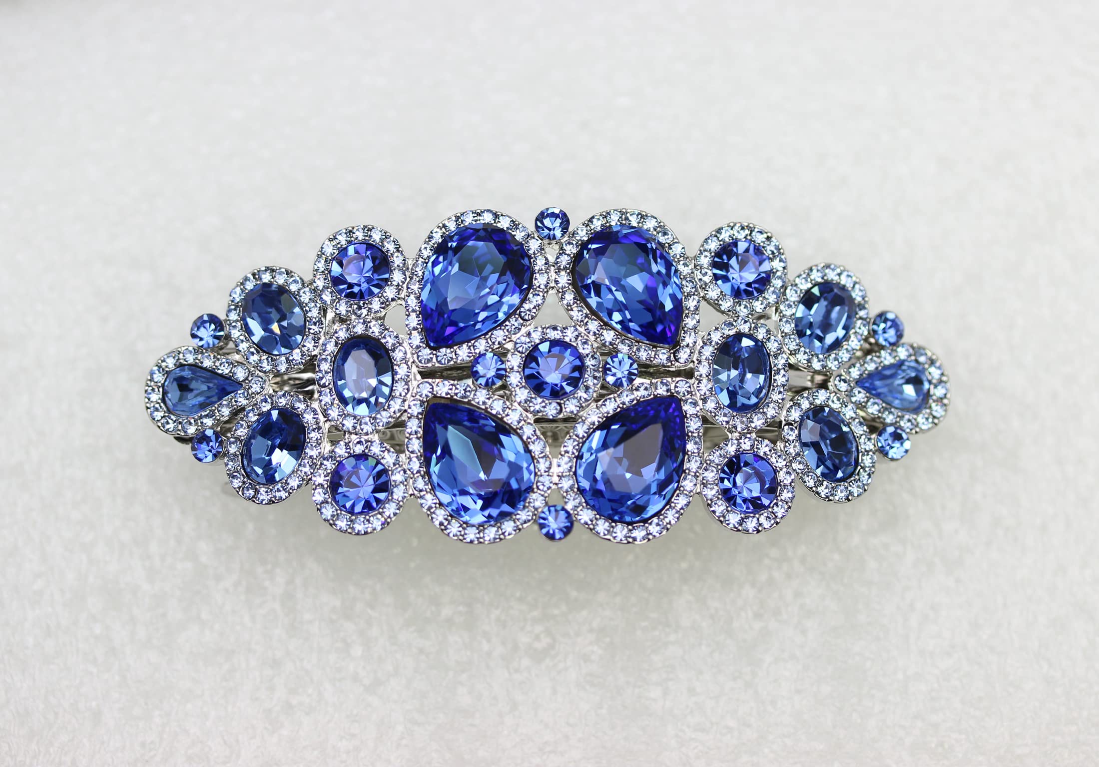 Faship sapphire crystal flower barrette closeup highlights intricate sparkle.