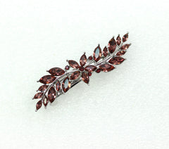 Faship Small floral barrette keeps hair secure with refined shine