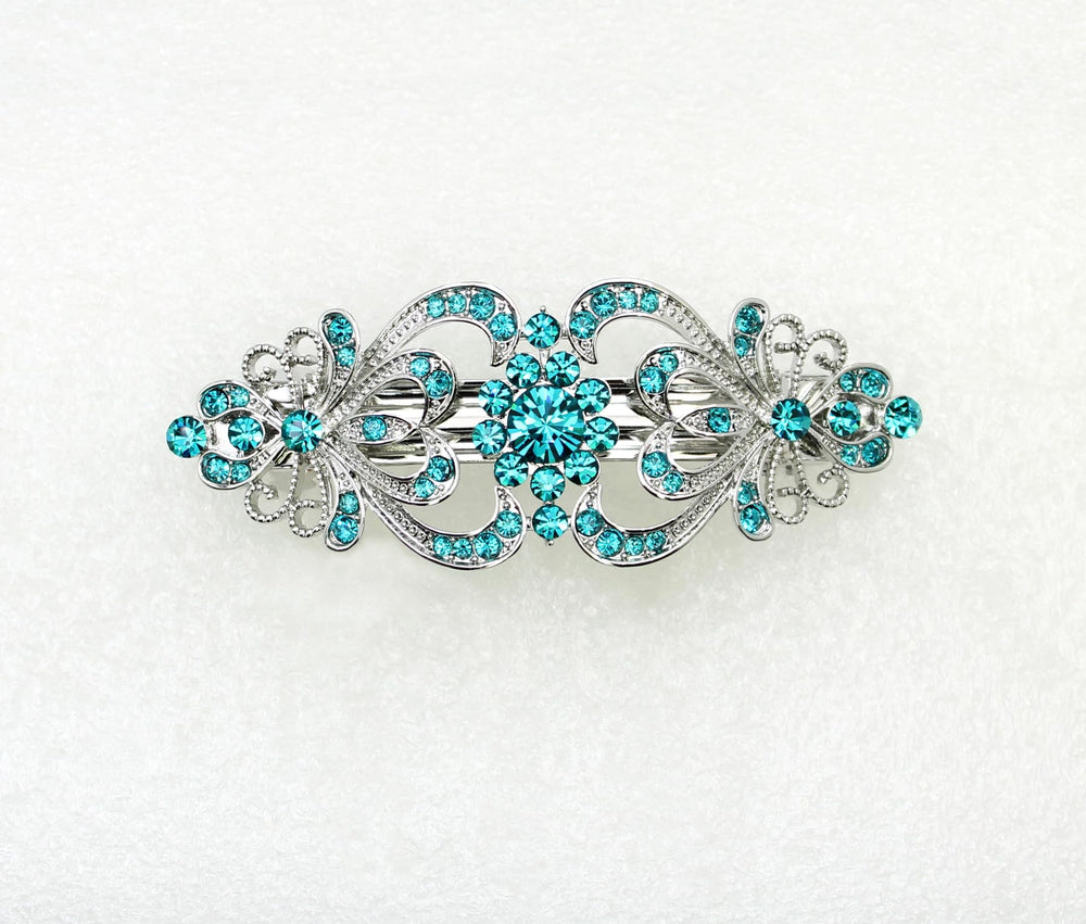 Faship teal rhinestone floral barrette enhances bridesmaid updo