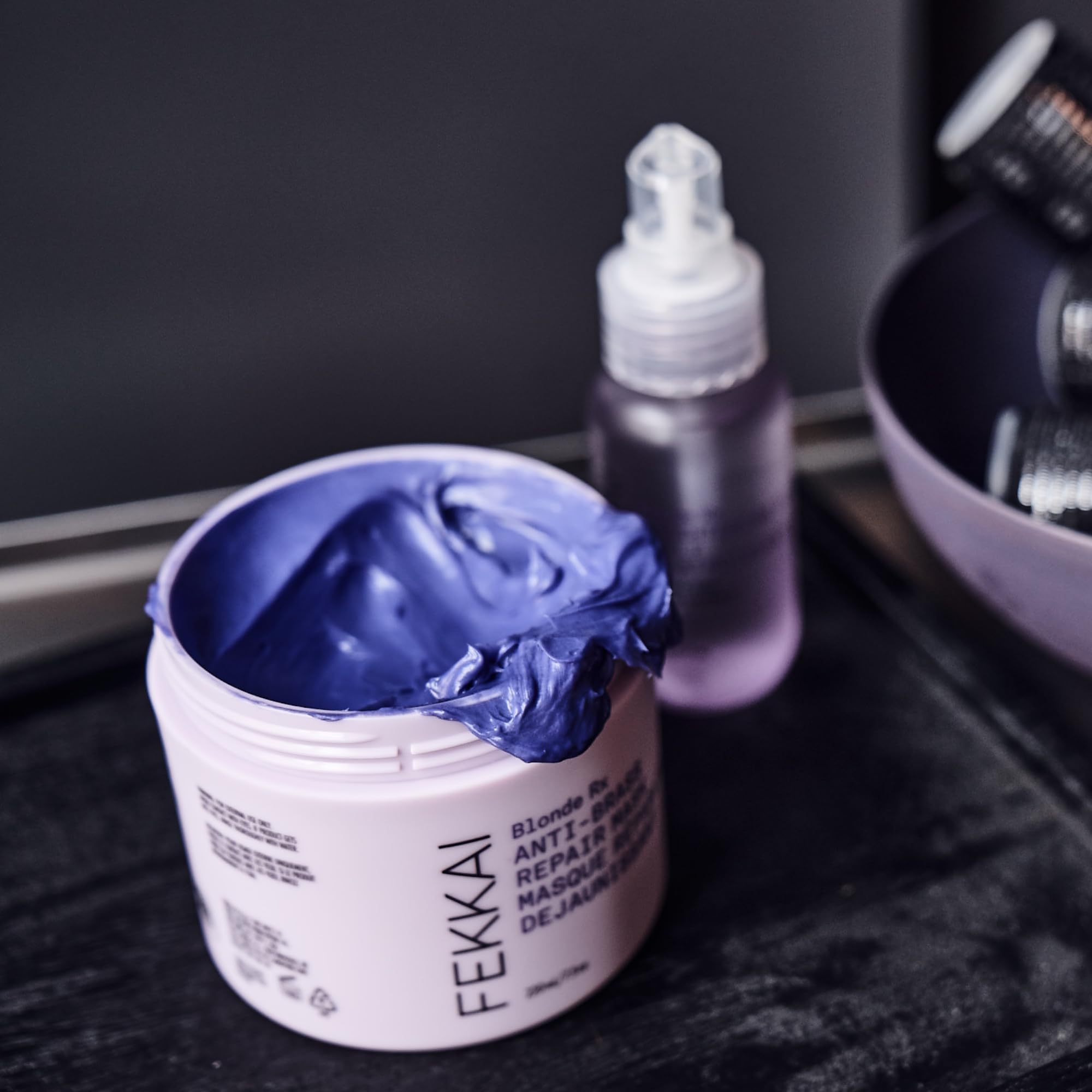 FEKKAI Blonde Rx Brightening Oil silky finish with heat protection.