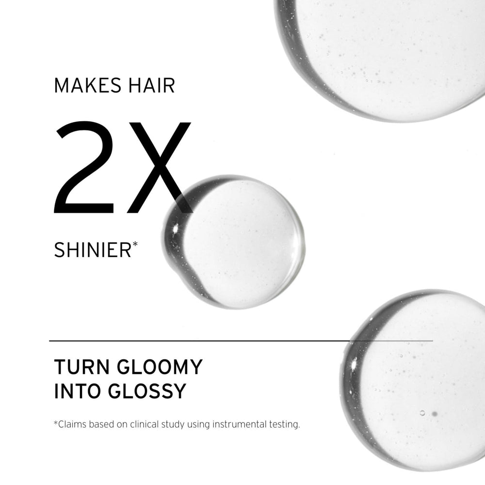 FEKKAI Brilliant Gloss Glass Hair Oil Serum bottle smooths and protects while styling.