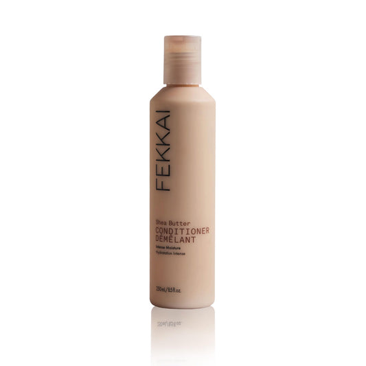 Fekkai Shea Butter Conditioner bottle demonstrates rich hydration for glossy, frizz-controlled hair
