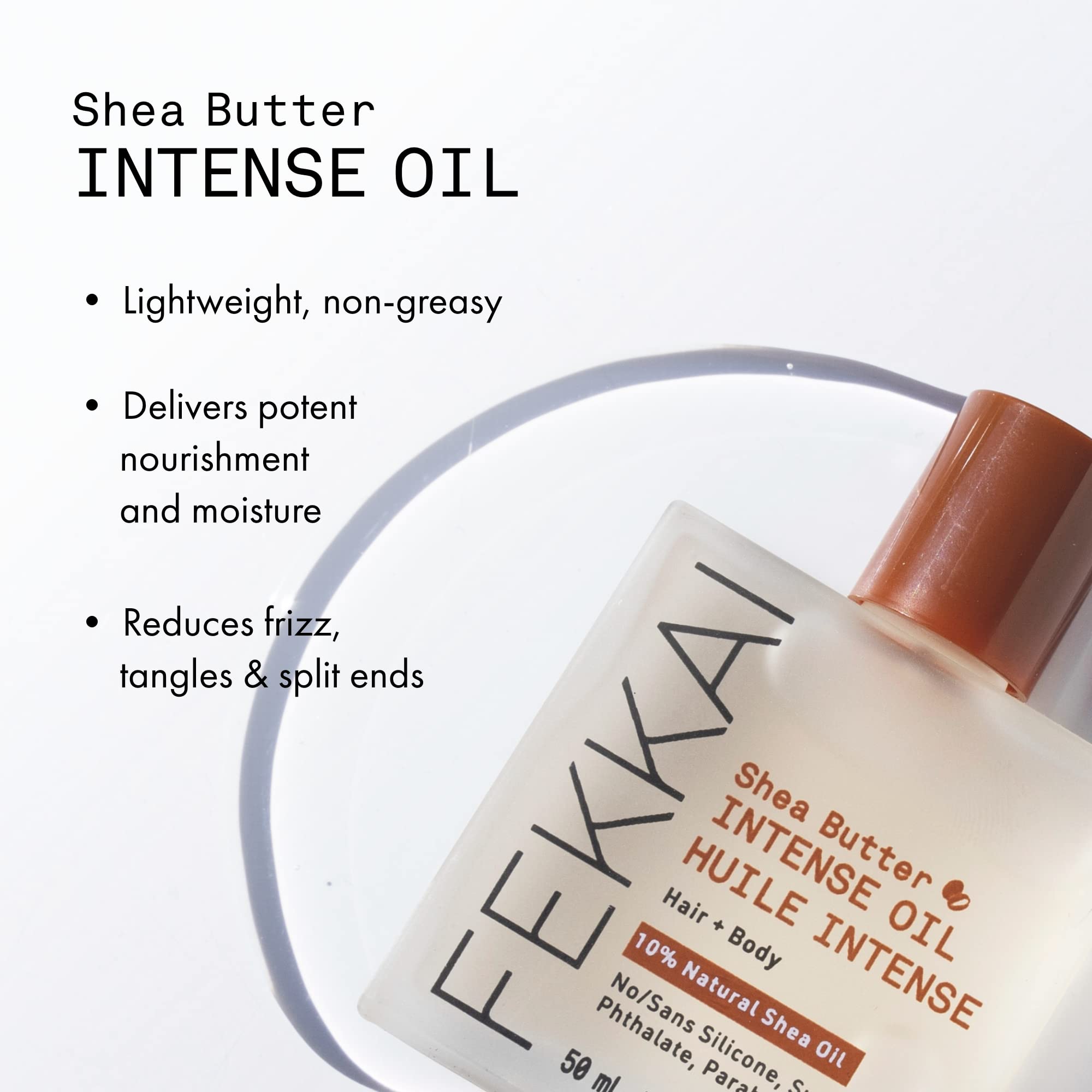 Fekkai Shea Butter Intense Oil applied to hair for lightweight hydration.
