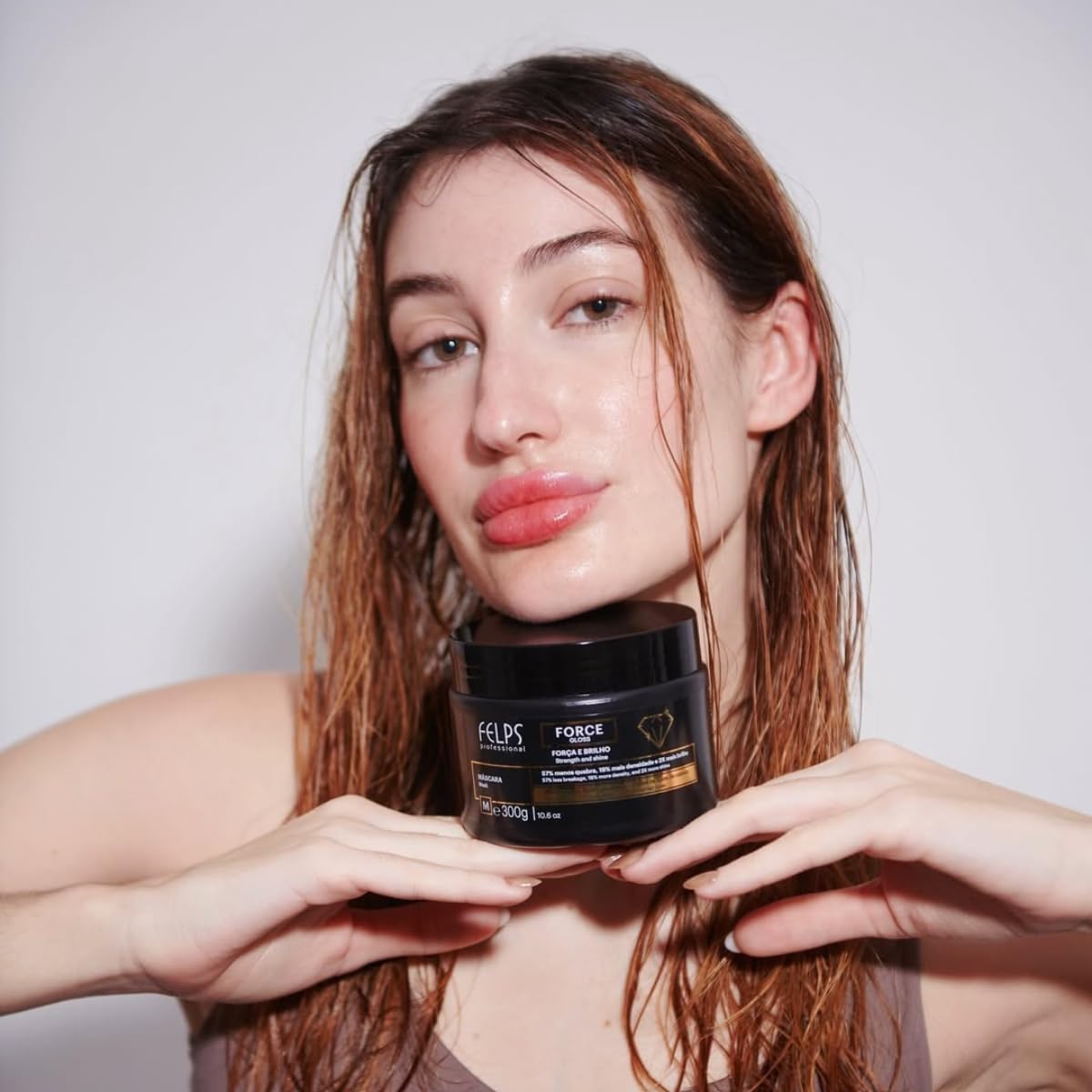 Felps Professional Force Gloss Leave-In close-up reveals luminous, glossy strands.