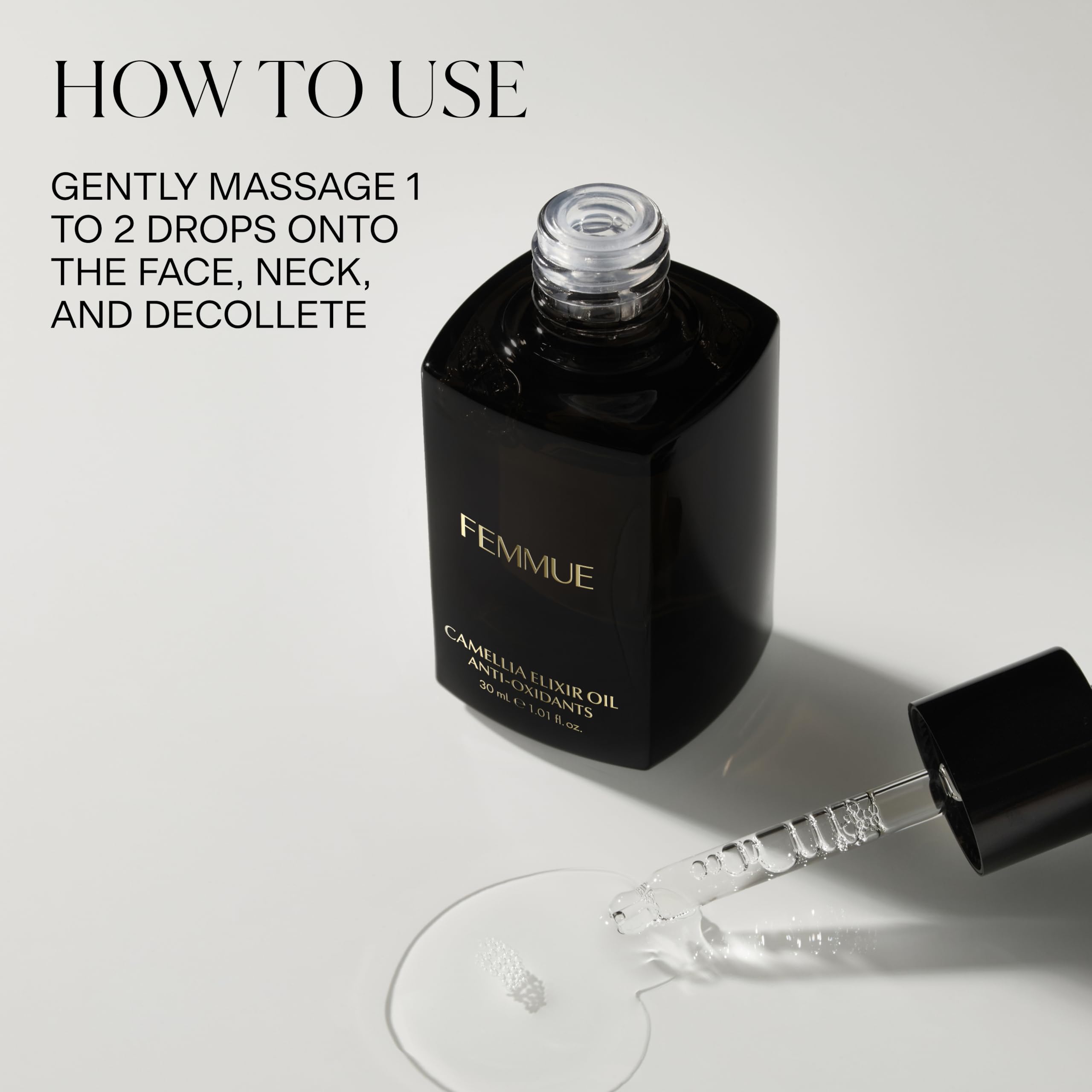 Gently applying FEMMUE Camellia Elixir to face for hydration