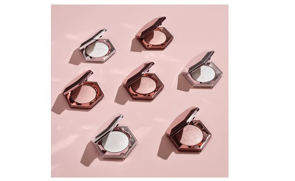 Fenty Beauty Diamond Bomb veil body glow for all-over shimmer.