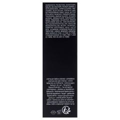 Gloss Bomb Cream Color Drip tube held for precise application