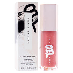 Fenty Beauty Gloss Bomb Lip Oil N Gloss 01 Fussy, swatch reveals lightweight shimmer.