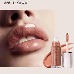 Gloss Bomb on lips for bright, glossy finish.