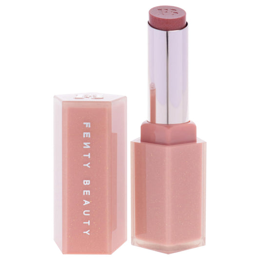 Swatch of Fenty Glow Gloss Bomb Stix Shimmer showing radiant shine on skin