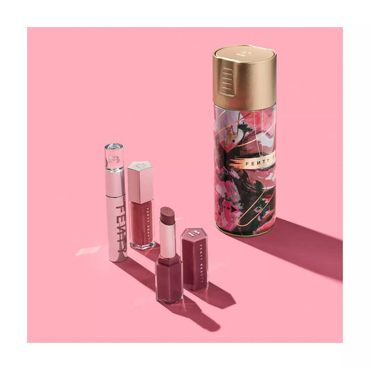Fenty Beauty Velvet Lipstick in Riri delivers velvety mauve-nude coverage.