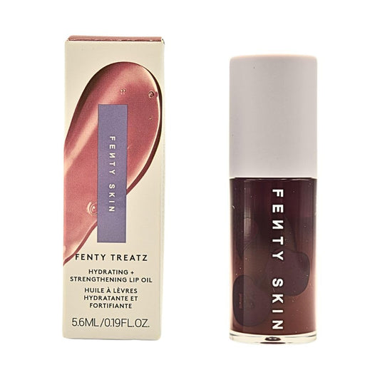 Fenty Beauty Treatz lip oil Black Cherry bottle for smooth hydration