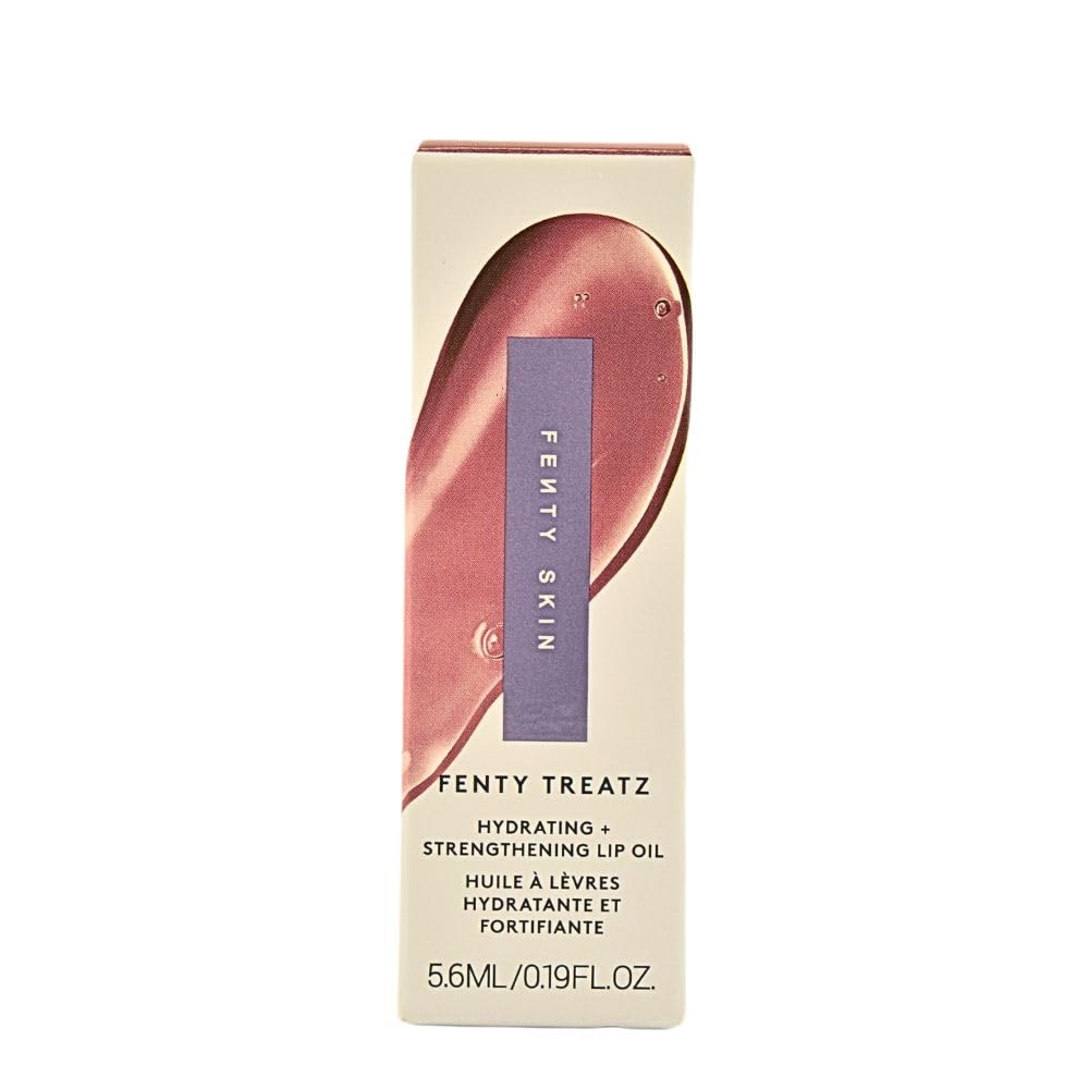 Oversized doe-foot applicator applying lip oil on lips