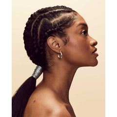 Fenty Hair Edge Smoothing demonstrates precise edge control for swooping styles.