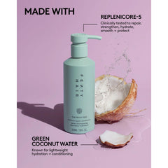Fenty Hair The Rich One bottle on a bathroom shelf for premium repair.