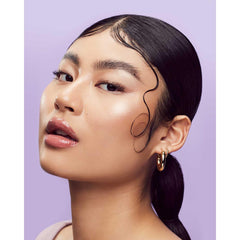 Fenty Hair Thickening Edge Gel enhances a fuller look on delicate edges.