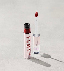 Fenty Icon Velvet Lipstick H.B.I.C. swatch on skin shows rich color payoff.