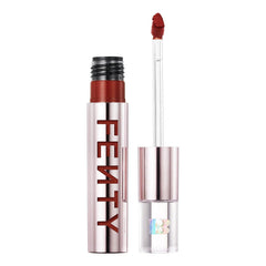 Fenty Icon Velvet Lipstick Wicked Whine application shot showing luxe, long-lasting color
