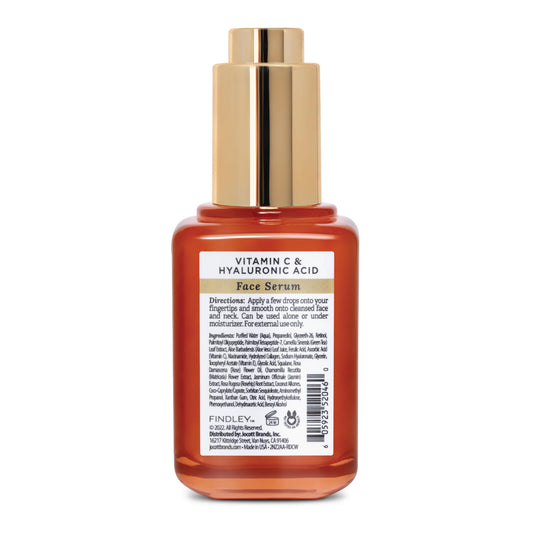 Findley All-in-One Face Serum bottle cap close-up highlights vitamin C and HA.