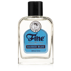 Fine men's aftershave bottle pour with Barber Blue scent, refreshing finish.