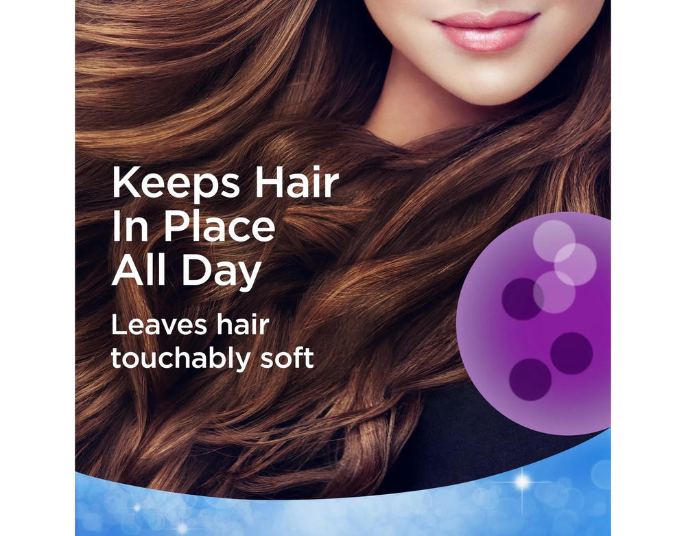 Finesse Extra Hold Hairspray can in-use closeup delivering controlled spray.