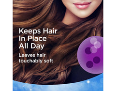 Finesse Extra Hold Hairspray can in-use closeup delivering controlled spray.
