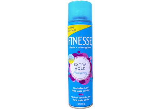 Finesse Extra Hold hairspray applied to styled hair for hold and movement.