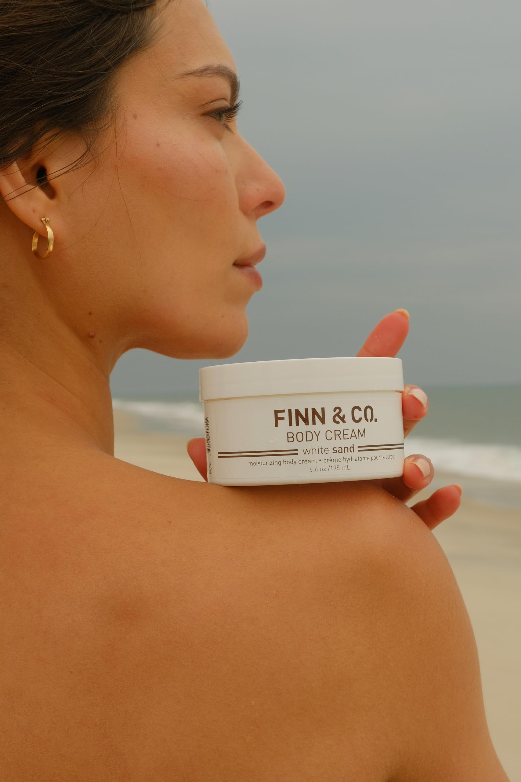 FINN & CO body cream texture close-up indicating quick, non-greasy absorption