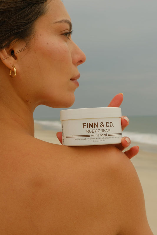FINN & CO body cream texture close-up indicating quick, non-greasy absorption