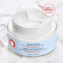 First Aid Beauty Firming Cream jar close-up reveals rich texture