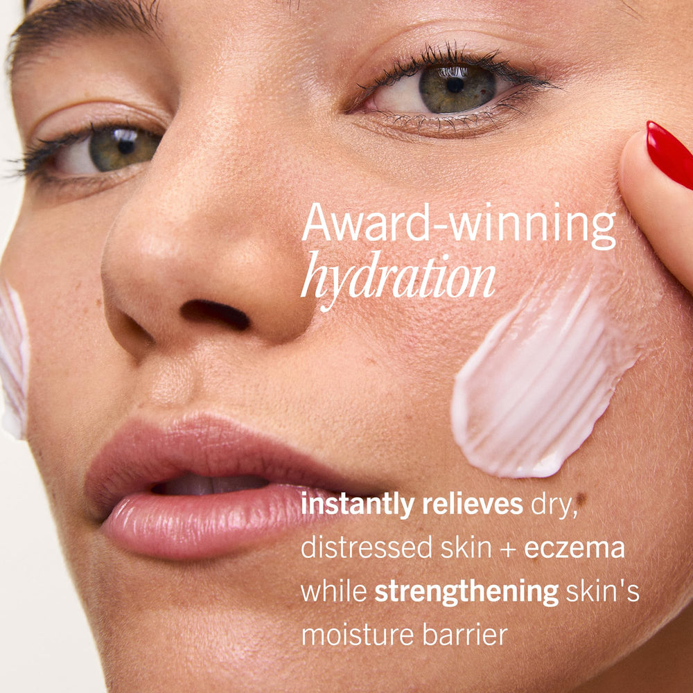 Applying First Aid Beauty Ultra Repair Cream on the face for soothing relief.
