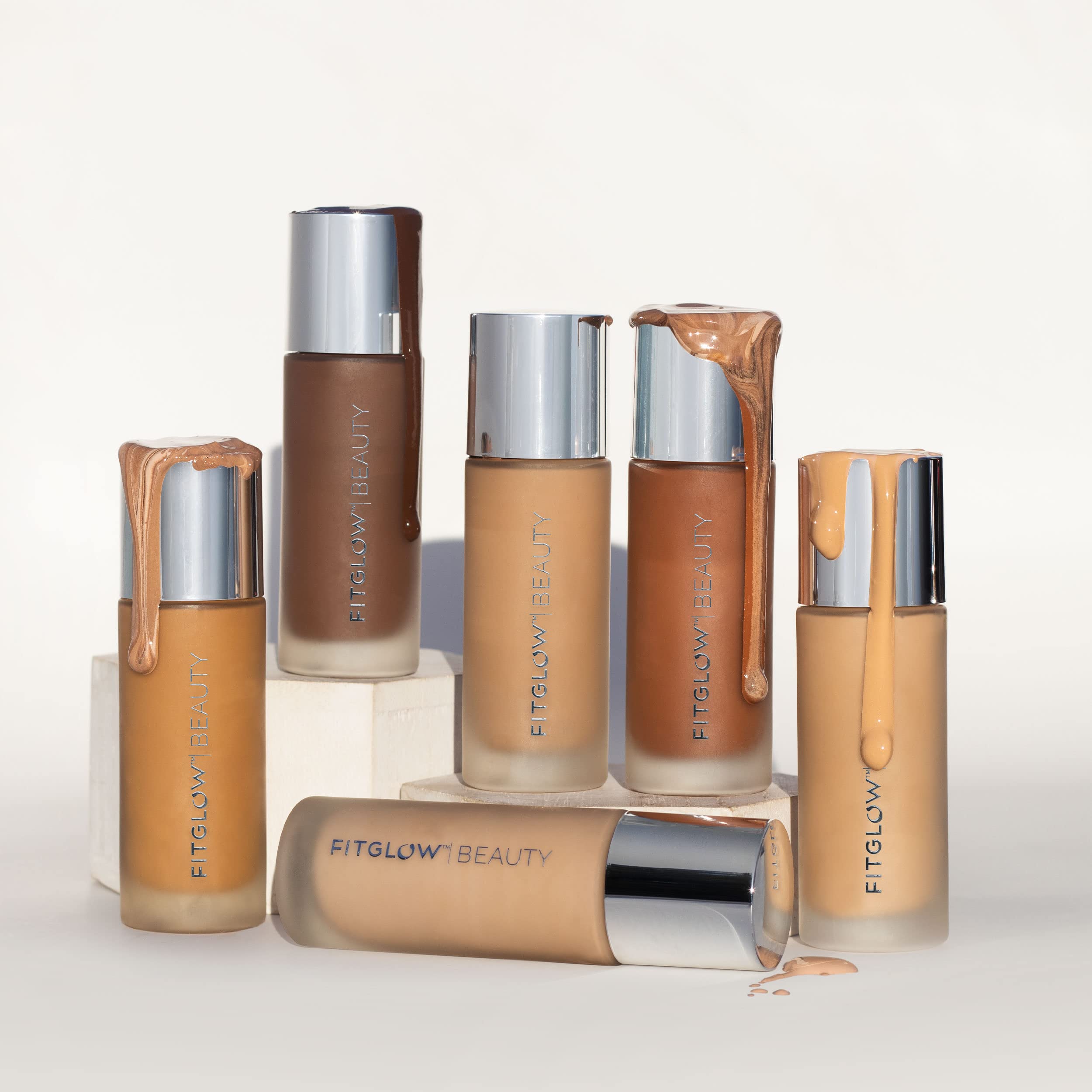 Fitglow Beauty Foundation+ pump and bottle conveying long-lasting natural radiance