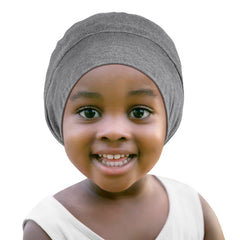 Fittia baby satin bonnet with adjustable strap securing overnight wear