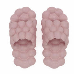 FJPTREN non-slip textured sole slippers offer secure grip on wet surfaces.
