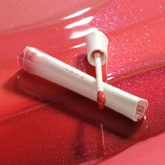 FLORASIS Celestial Luster Lip Gloss delivers a 3D glass-film glow for luminous lips