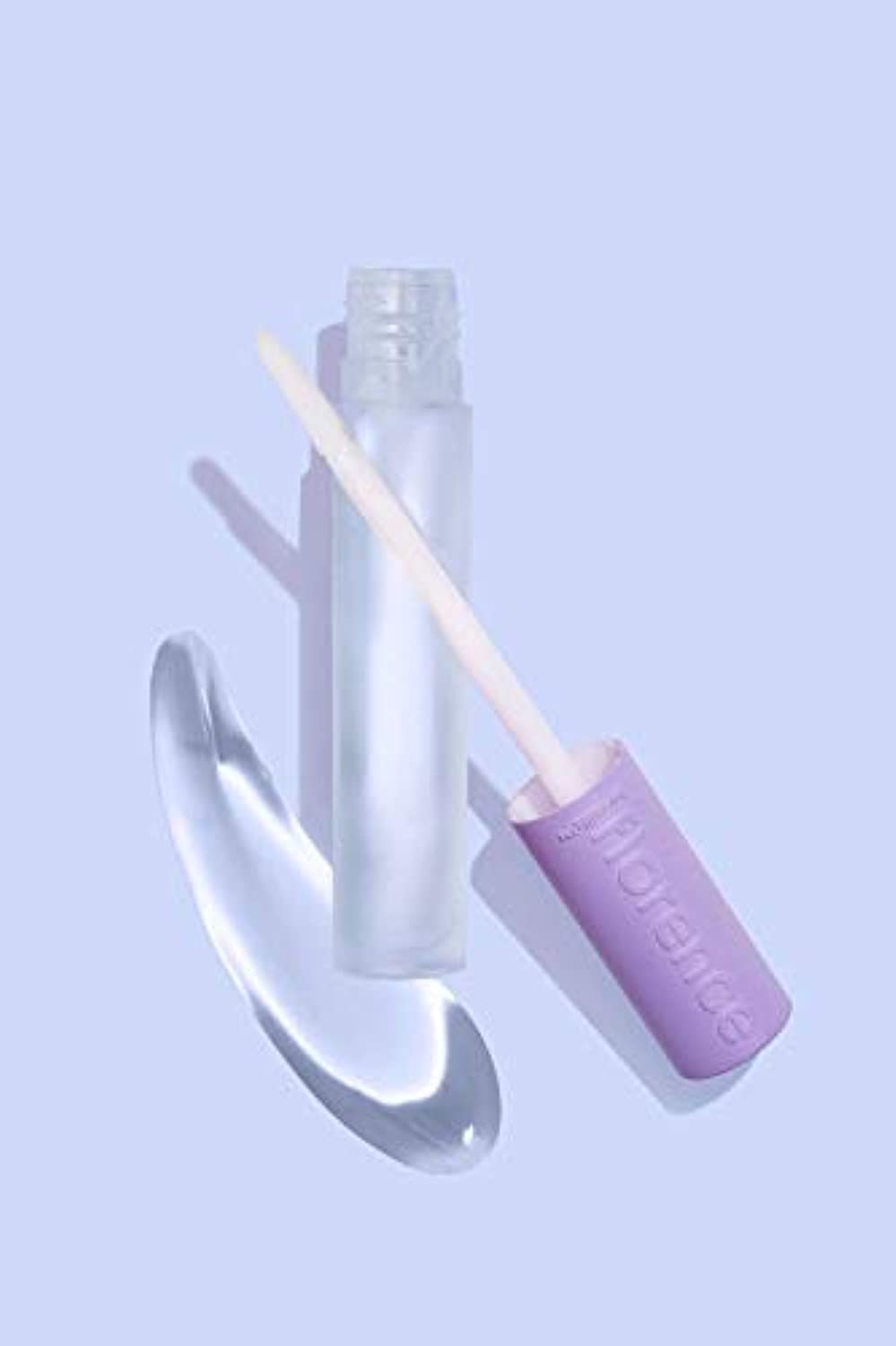 Florence by Mills Get Glossed lip gloss application shows sheer shine and nourishing feel.
