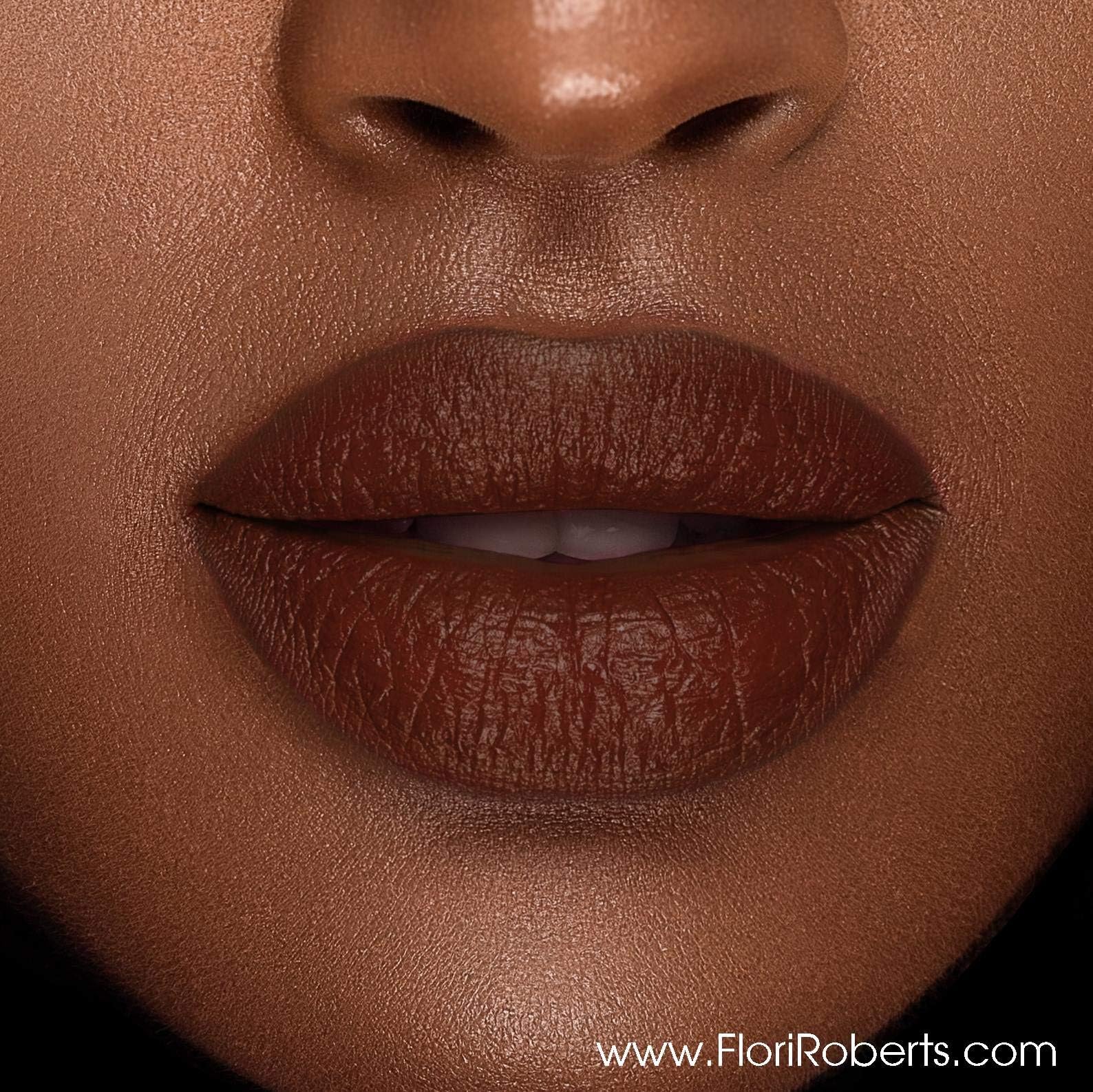 Flori Roberts Luxury Lipstick demi-matte finish glides for crisp definition.