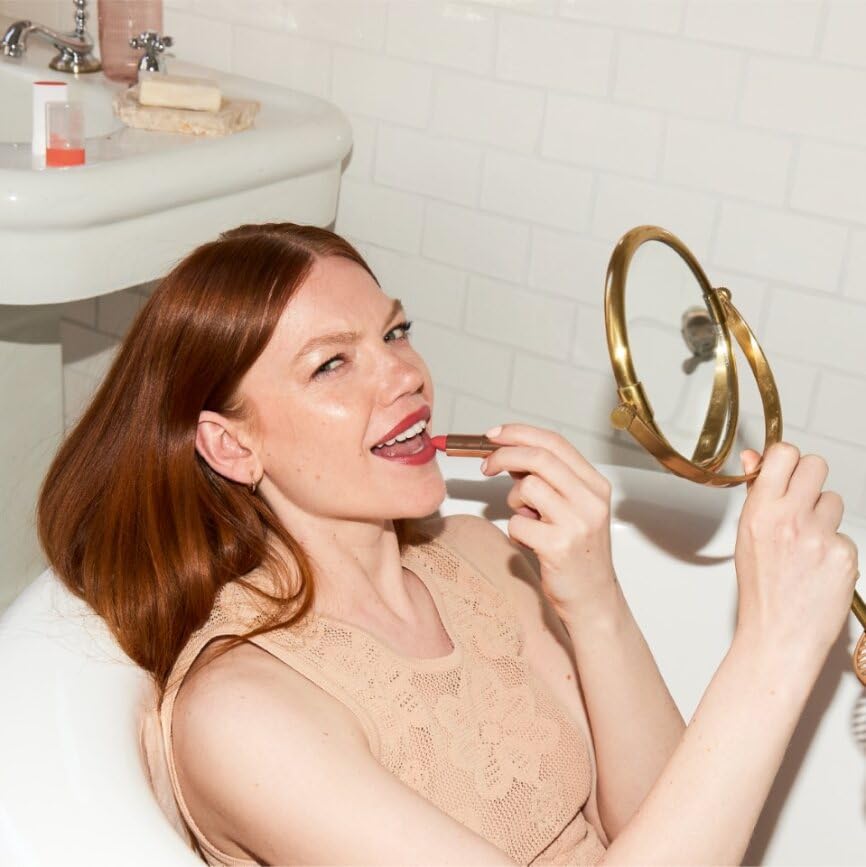 FLOWER Beauty Perfect Pout Lipstick Buttercup packaging showcases vegan, cruelty-free ethos.