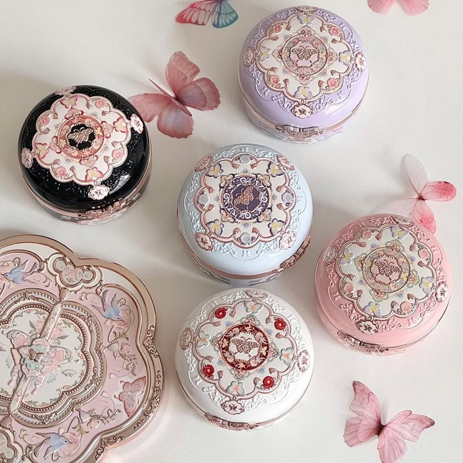 Flower Knows Butterfly Cloud Collar compact on the go for quick touch-ups.