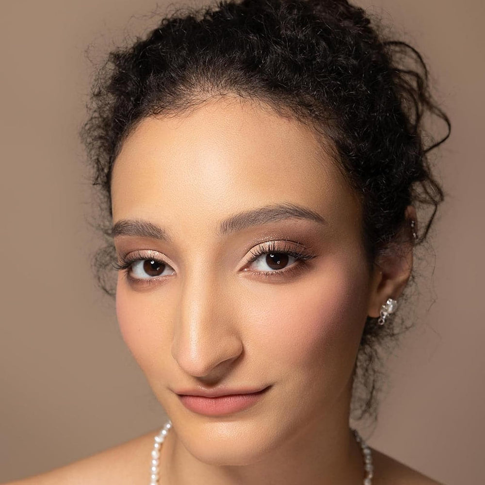 03 Classic Ballet petal pink shade flatters warm undertones.