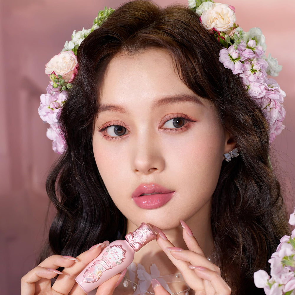 Flower Knows G05 Freesia candy pink shade on lips.