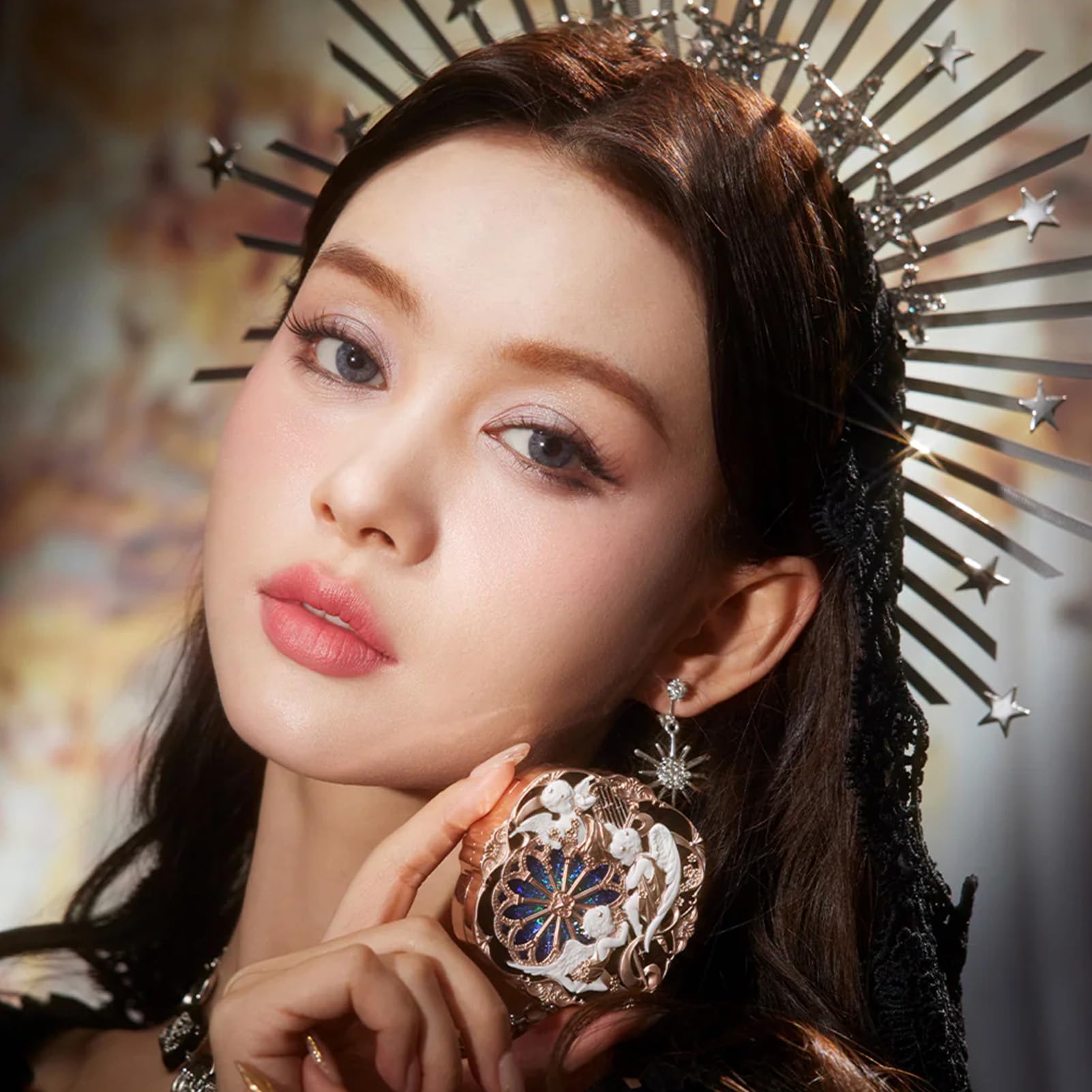 Flower Knows cushion puff pairs with blush for precise application.