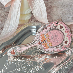 Flower Knows Paddle Brush helps tidy hair and complete a look.